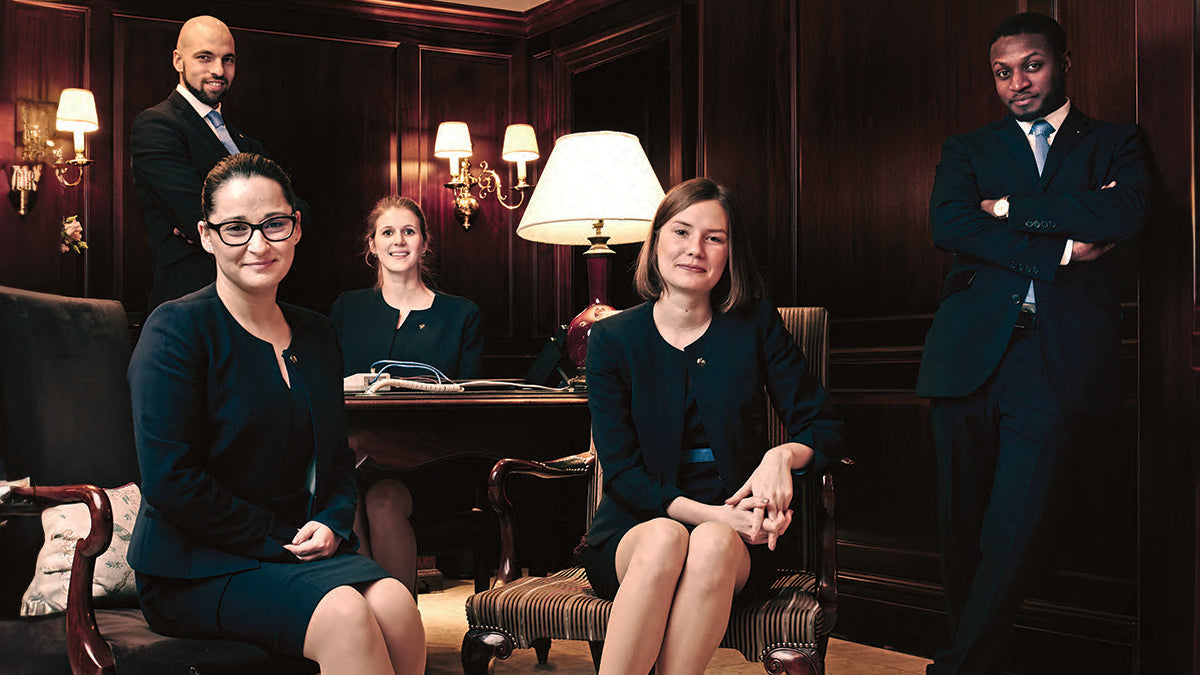 Gresham Blake Studios bespoke hotel uniform — luxury hotel front of house